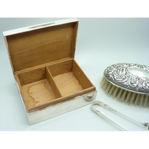 7149 - Four silver items, cigarette box, Walker & Hall, brush, pierced dish, a/f and a pair of sugar bows, ... 