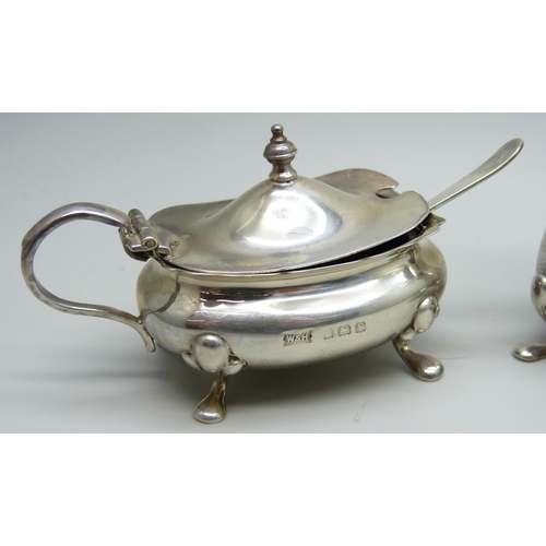 7158 - A three piece silver condiment set, 100g, (one spoon plated)