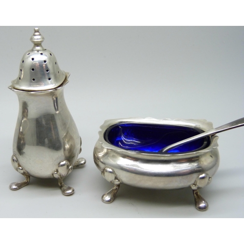 7158 - A three piece silver condiment set, 100g, (one spoon plated)