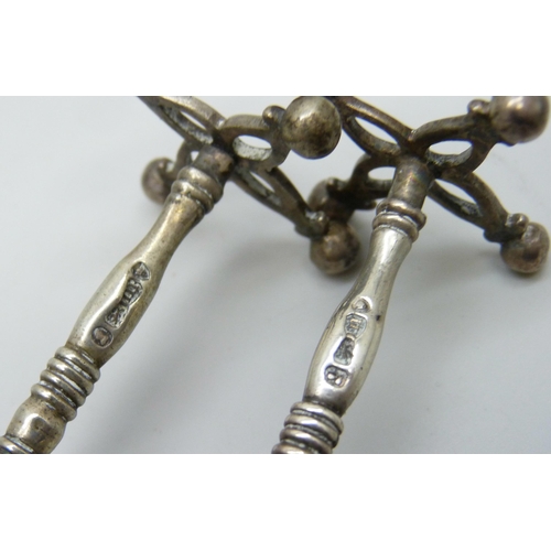 7167 - A pair of George IV silver knife rests, London 1827, 39g