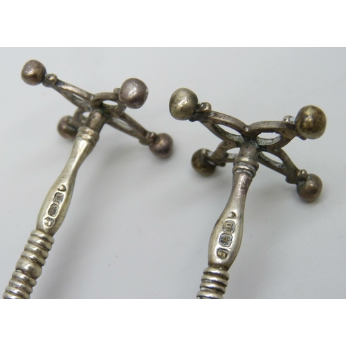 7168 - A pair of George IV silver knife rests, London 1827, 39g