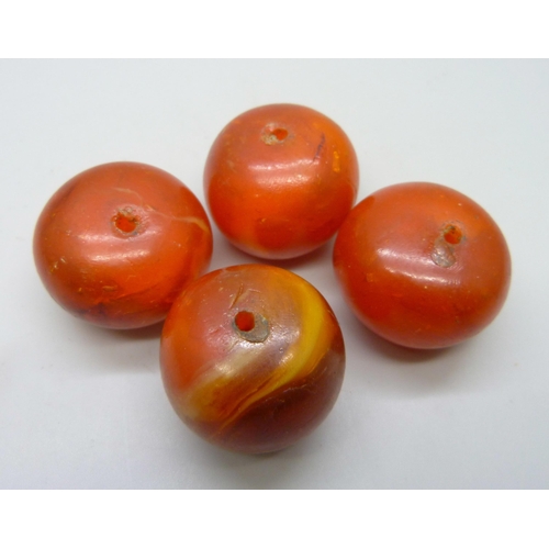 7171 - Four large amber beads, 65g, 30mm