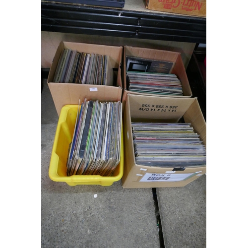 5243 - A large amount of LP records (4 boxes) assorted genres including box sets, pop, rock, country, etc.