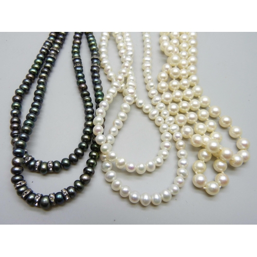 7183 - Three double strings of Baroque cultured pearls, one with a silver clasp