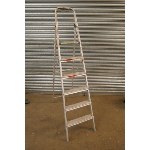 5358 - An aluminium 6 rung step ladder and a folding step stool