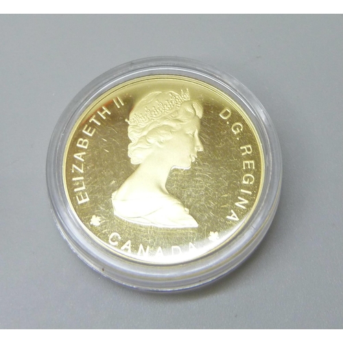 7233 - A Royal Canadian Mint 1989 $100 Gold Proof Coin (13.338g)