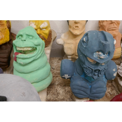 5372 - 6 concrete busts featuring mainly film characters including Hellboy, Robo Cop, Slimer and Bruce Lee ... 