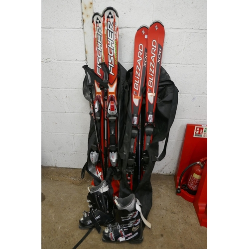 5382 - A pair of Fisher Carbofire skis and a pair of Blizzard X06 skis and a pair of Nordica Speed Machine ... 