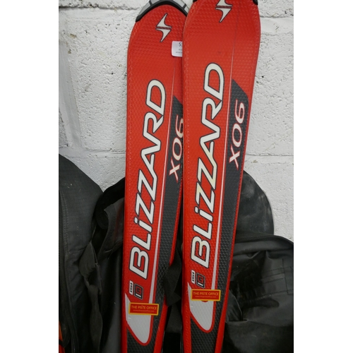 5382 - A pair of Fisher Carbofire skis and a pair of Blizzard X06 skis and a pair of Nordica Speed Machine ... 