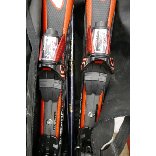 5382 - A pair of Fisher Carbofire skis and a pair of Blizzard X06 skis and a pair of Nordica Speed Machine ... 