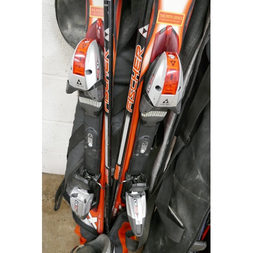 5382 - A pair of Fisher Carbofire skis and a pair of Blizzard X06 skis and a pair of Nordica Speed Machine ... 