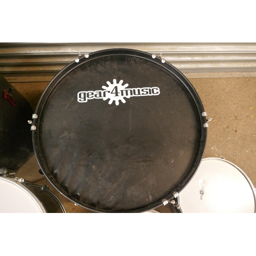 5399 - A Gear 4 Music drum kit with cases and a bass pedal