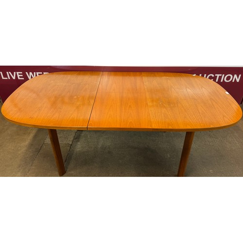 68 - A G-Plan Sierra teak extending dining table and six Fresco chairs