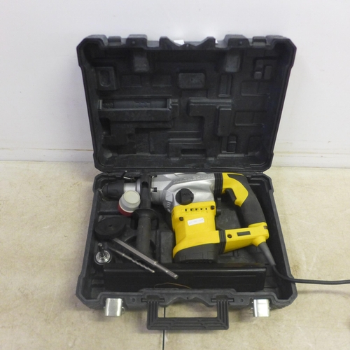 5019 - A Magnesium 1250W 240v 3 function Rotary Impact Drill - with case 15/0125* This lot is subject to VA... 