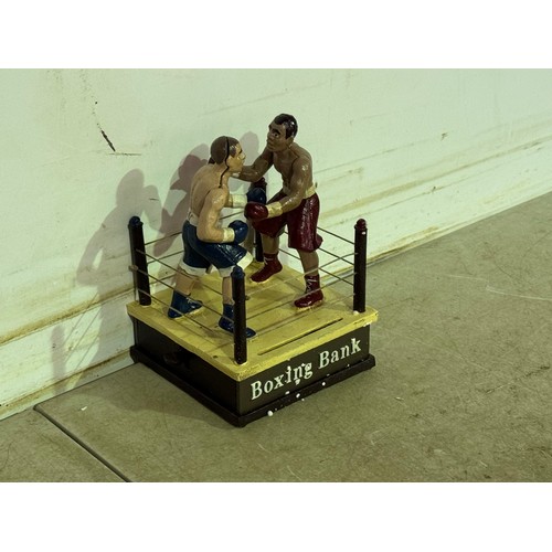 5130 - A cast metal boxing ring piggy bank with moving parts* This lot is subject to VAT