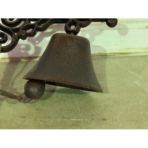 5168 - A cast metal Springer Spaniel bell with wall bracket* This lot is subject to VAT