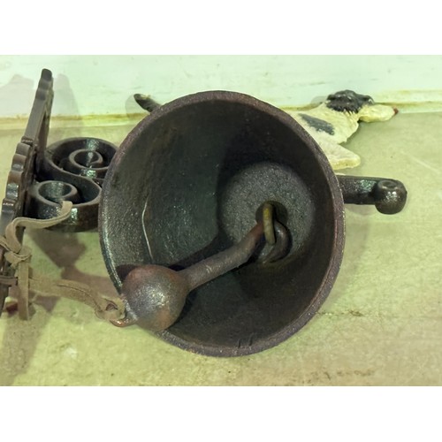 5168 - A cast metal Springer Spaniel bell with wall bracket* This lot is subject to VAT