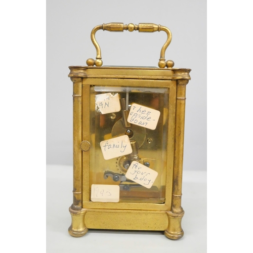 2011 - A 19th Century gilt brass carriage clock with key in a fitted travel case