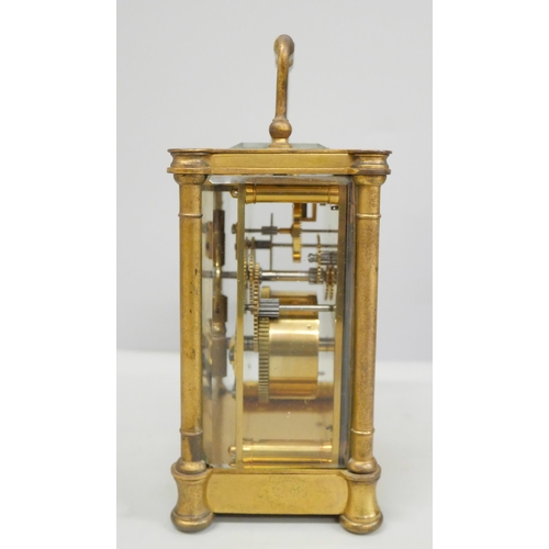 2011 - A 19th Century gilt brass carriage clock, with key and in a fitted traveling case