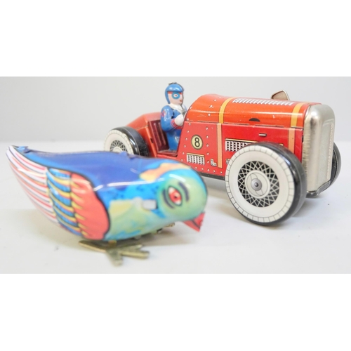 2039 - A Chad Valley remote control car and four tin plate toys