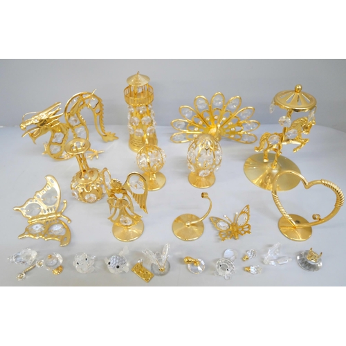 2043 - Ten small Swarovski crystal ornaments and other brass and crystal ornaments