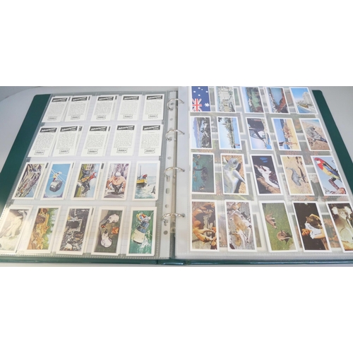 2079 - A folder of cigarette cards, confectionary and tea cards, part and full sets