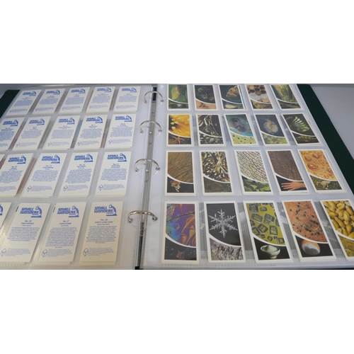 2082 - A folder of cigarette cards, confectionary and tea cards, part and full sets