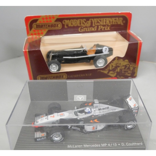 2098 - A collection of die-cast Formula 1 and sports cars, comprises Mini Champs, Onyx, Cararama, Corgi