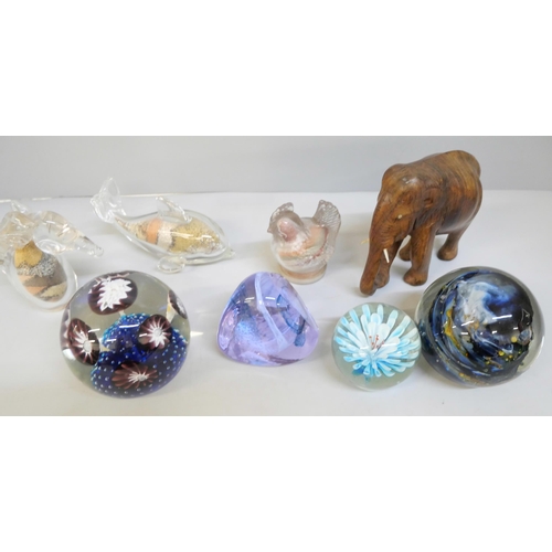 2116 - A collection of glass paperweights, Isle of Wight Alum Bay sand/glass paperweight and a wooden eleph... 