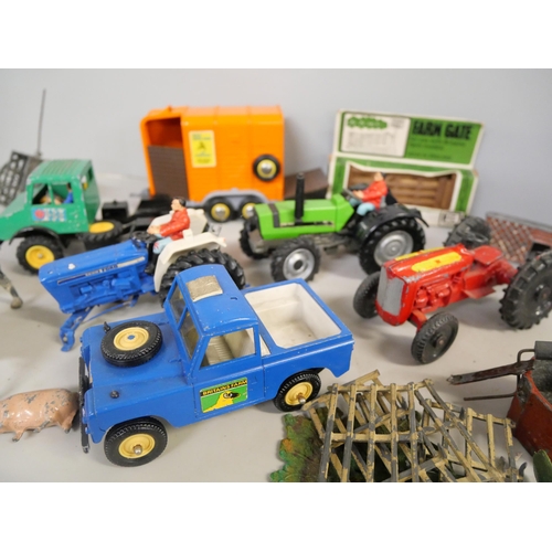 2126 - A collection of mostly Britains Farm animals, figures, accessories and vehicles including tractors, ... 