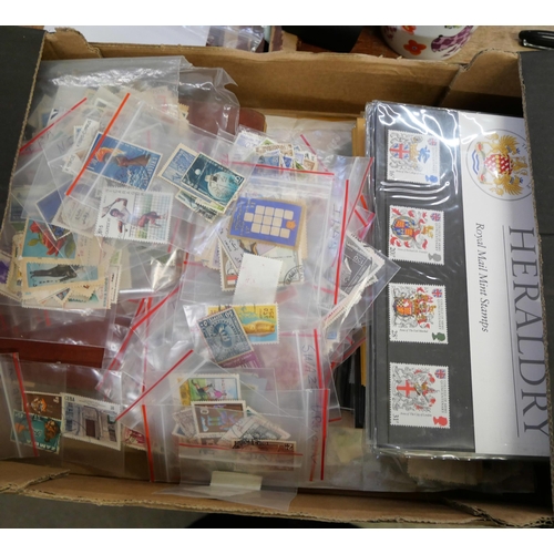 2129 - A collection of stamps and Royal Mail presentation packs, etc.