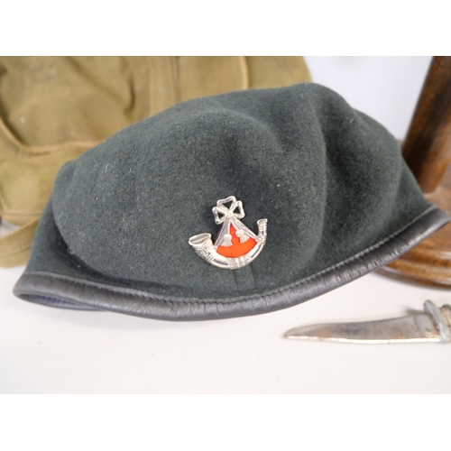 2139 - A British army helmet, Bosnia conflict, a beret, bone handled knife and a canvas bag *This lot Not A... 