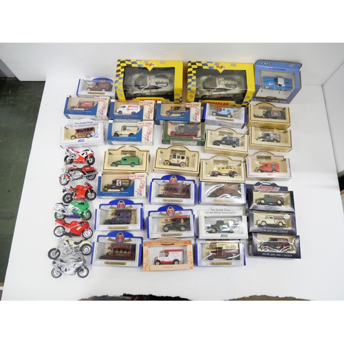 2153 - A box of die-cast model vehicles, Days Gone, Corgi, Shell, etc., boxed and loose motorcycles