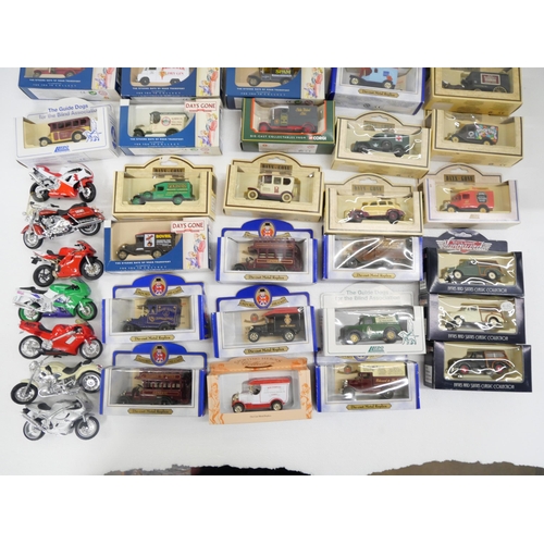 2153 - A box of die-cast model vehicles, Days Gone, Corgi, Shell, etc., boxed and loose motorcycles