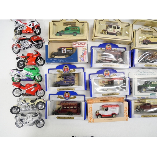 2153 - A box of die-cast model vehicles, Days Gone, Corgi, Shell, etc., boxed and loose motorcycles