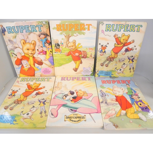 2156 - Rupert the Bear Annuals, jigsaws, cassette tapes, stamp starter pack, in case and bag