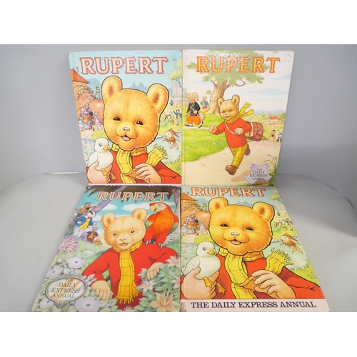 2156 - Rupert the Bear Annuals, jigsaws, cassette tapes, stamp starter pack, in case and bag