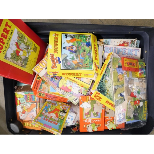 2156 - Rupert the Bear Annuals, jigsaws, cassette tapes, stamp starter pack, in case and bag