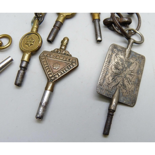 2164 - A collection of pocket watch keys