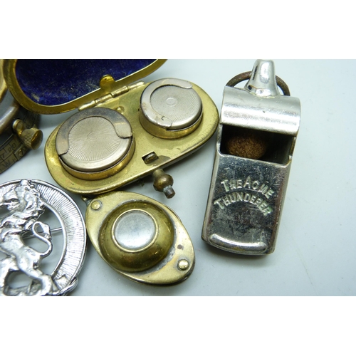 2165 - A pocket compass, Short & Mason, a double sovereign case, a magnifying glass with compass, a whistle... 