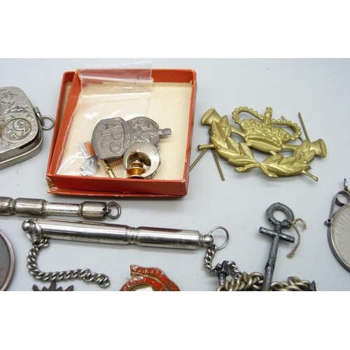 2166 - A WWI Wound badge, B316883, other badges, a coin case, a compass, etc.