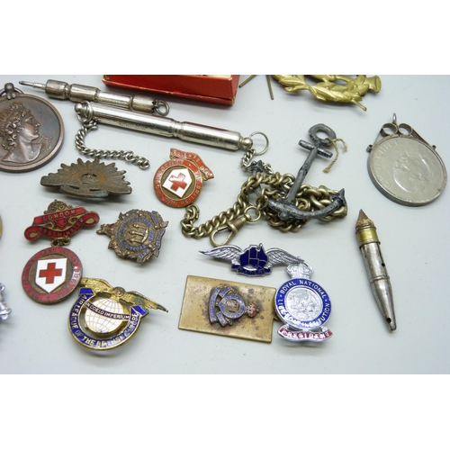 2166 - A WWI Wound badge, B316883, other badges, a coin case, a compass, etc.