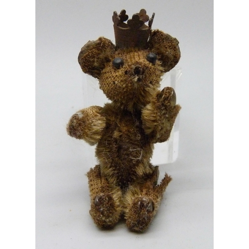 2168 - A small Teddy bear with crown, 7cm