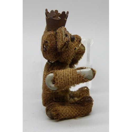 2168 - A small Teddy bear with crown, 7cm