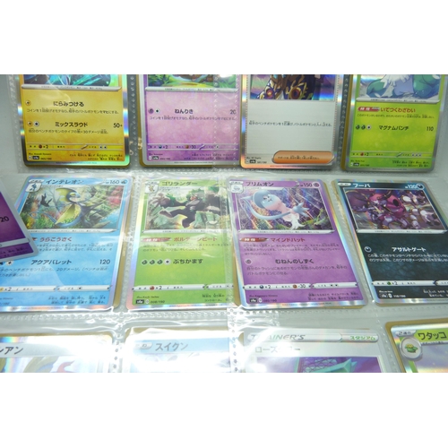 2182 - Over 500 Japanese Pokemon cards in tin with sleeved Holographic