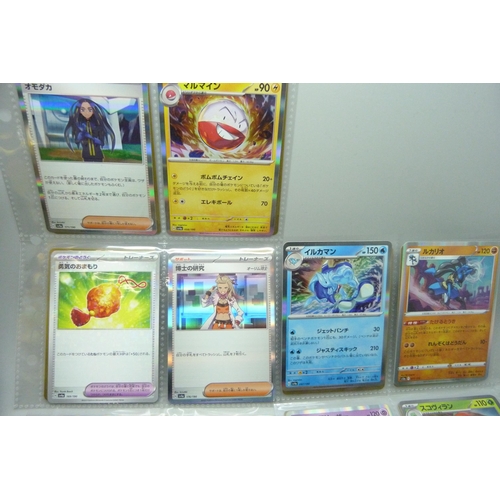 2182 - Over 500 Japanese Pokemon cards in tin with sleeved Holographic