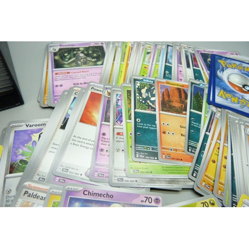 2184 - A box containing over 500 Pokemon cards with large quantity of Holographic