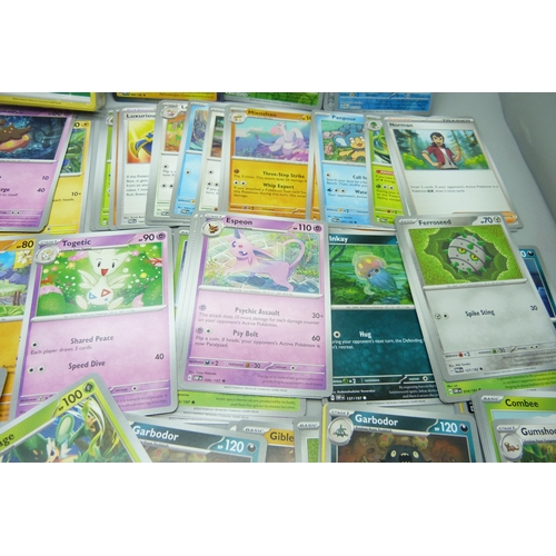 2185 - A box containing over 500 Pokemon cards with large quantity of Holographic