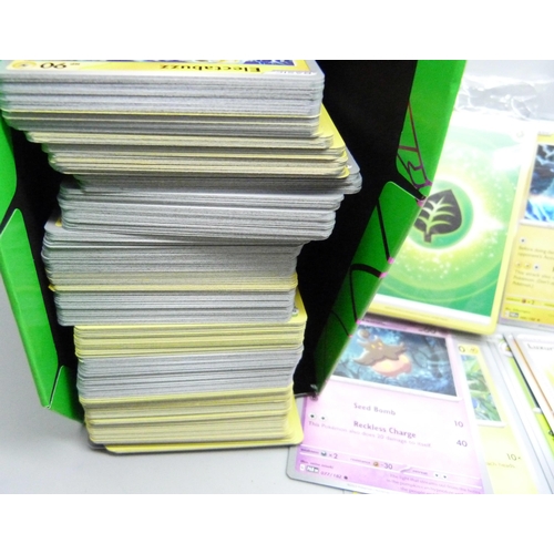 2185 - A box containing over 500 Pokemon cards with large quantity of Holographic