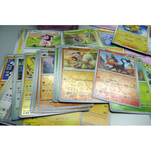 2185 - A box containing over 500 Pokemon cards with large quantity of Holographic